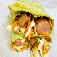 Spinach Wrap Beef and Sausage Shawarma · Diced beef and 100% beef sausage with cabbage mix with some ketchup mix tightly rolled in a ...