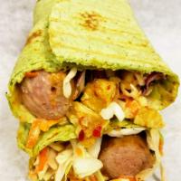 Spinach Wrap Chicken and Sausage Shawarma · Diced chicken breast and 100% beef sausage with cabbage mix with some ketchup mix tightly ro...