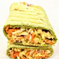 Beyond Shawarma - Spinach Wrap Tofu Shawarma · Seasoned tofu nestled with some cabbage mix and some ketchup mix tightly rolled in spinach h...
