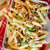 Loaded Baked Potato Fries/Tots · Queso, Bacon and scallions over Tots and Fries