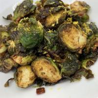 Crispy Brussels · Topped with Bacon, Brown Sugar & Lemon Zest