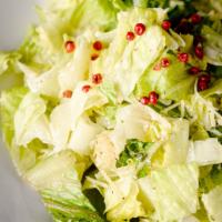 Caesar Salad · Romaine lettuce, Parmesan cheese, croutons and Caesar dressing.