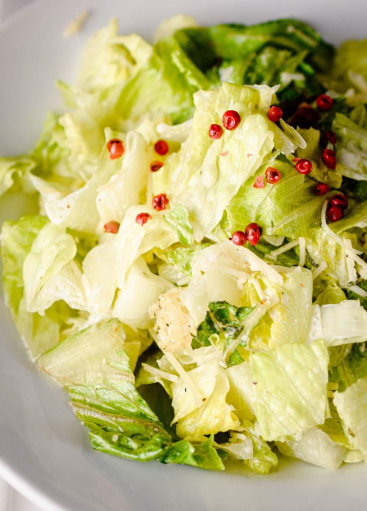 Caesar Salad · Romaine lettuce, Parmesan cheese, croutons and Caesar dressing.