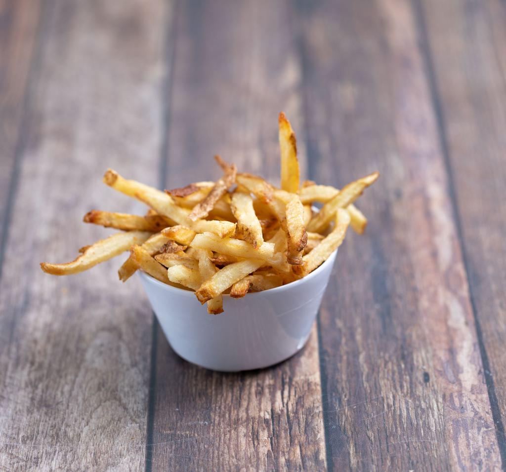 French Fries · Hand-cut and homemade. Add cheese or cheese and bacon for an additional charge.