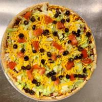 Taco Pizza · Ortega taco sauce, beef, mozzarella cheese baked to perfection then topped with fresh lettuc...