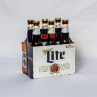 6 Pack of Bottled Miller Light Beer  · Must be 21 to purchase. 12 oz. 4.2% ABV.