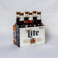 6 Pack of Bottled Miller Light Beer · Must be 21 to purchase. 12 oz. 4.2% ABV.