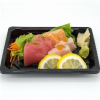 A10. Sashimi Appetizer · 2 pieces salmon, 2 pieces tuna, and 2 pieces hamachi.