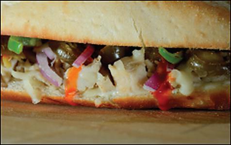 Buffalo Chicken Sandwich · Loaded with grilled chicken and topped with fresh mozzarella cheese, crisp green peppers and red onions. Square the heat factor with a generous helping of jalapenos. Served up on soft and toasted bread.