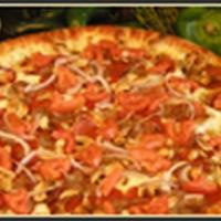 Nutty Chipotle Pizza · Zesty chipotle pesto is topped with spicy Italian sausage, pepperoni, red onions, tomatoes a...