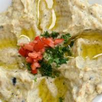 Baba Ghanoush · Fire roasted eggplants pureed with a touch of garlic, spices, lemon juice, fresh made tahini...