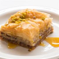Baklava · A rich, sweet dessert pastry made of layers of filo filled with chopped nuts and sweetened a...