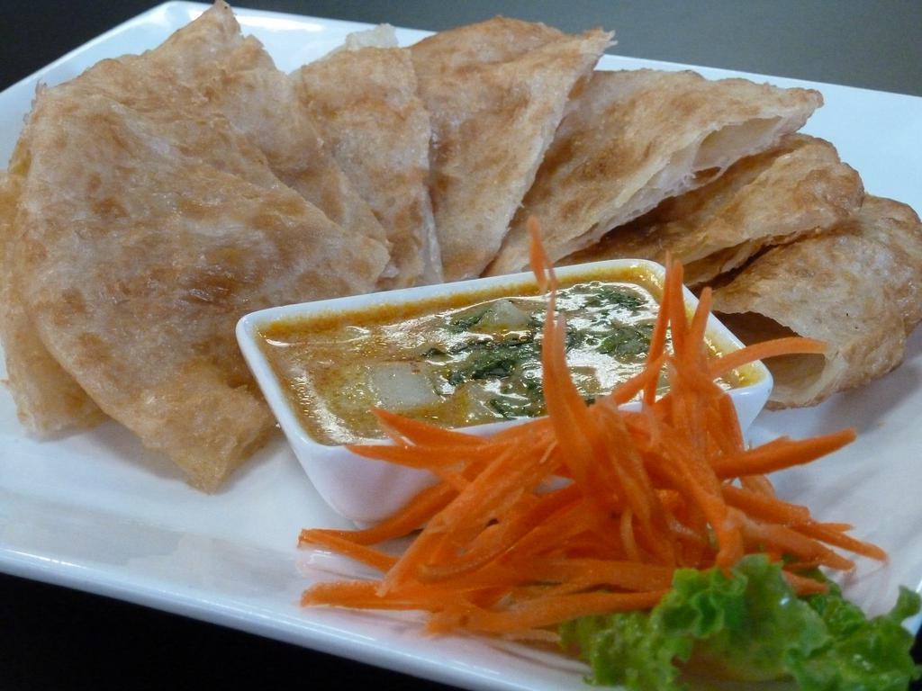 1. Roti · Roti Bread served with yellow curry sauce