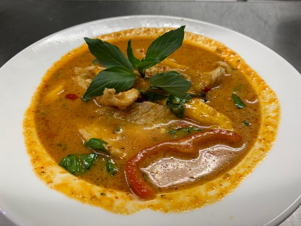 49. Panang Curry · Panang curry paste with coconut milk with finely slice kaffir lime leaf, bell peppers and sweet basil. (no rice included)