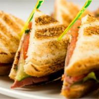 Chino Club Sandwich · Teriyaki chicken, roasted pork, smoked bacon, lettuce, tomato, chipotle mayo, on ciabatta, a...