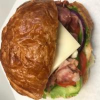 Pastrami croissant · A flaky French pastry.