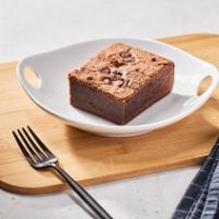 Fudgy Brownie by Homeroom  · By Homeroom. A delicious, freshly baked, dark chocolate chunk brownie. Contains dairy and eg...