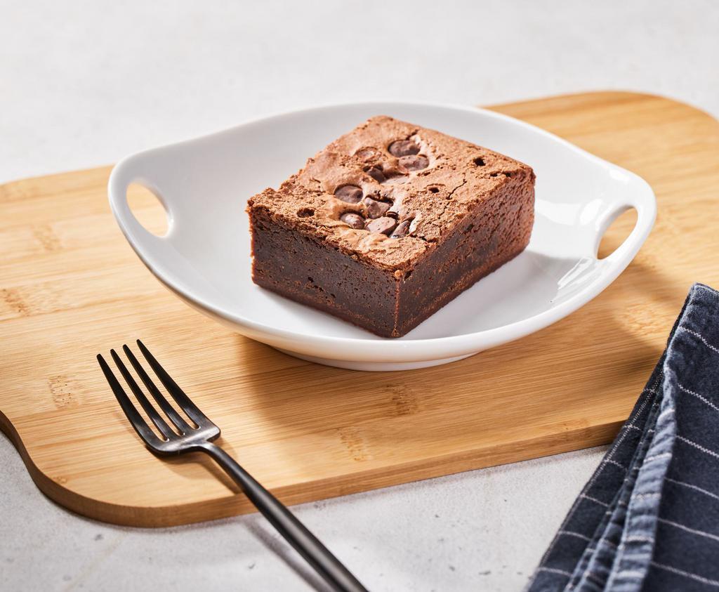 Fudgy Brownie by Homeroom  · By Homeroom. A delicious, freshly baked, dark chocolate chunk brownie. Contains dairy and eggs. We cannot make substitutions.