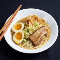 The 'Tampopo' Ramen Classic · Organic ramen with braised pork belly, tea infused egg, and menma in a soyu-miso-katsu blend...
