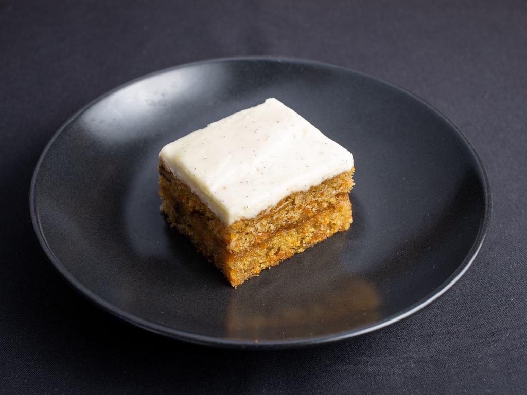 Cindy's Eight Spice Pineapple Carrot Cake (V) by China Live Signatures · By China Live Signatures. Tropical pineapple and coconut hints in classic carrot cake with cream cheese frosting. Contains gluten, tree nuts, eggs, and coconut. We cannot make substitutions.