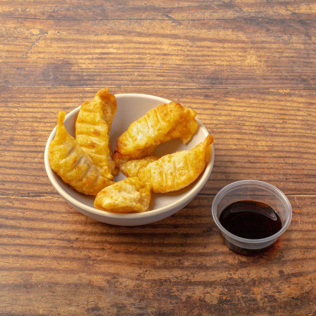 Chicken Gyoza by Glaze Teriyaki Grill · By Glaze Teriyaki Grill. Crispy dumplings filled with minced chicken. Served with our gyoza dipping sauce. Contains gluten and soy. We cannot make substitutions.