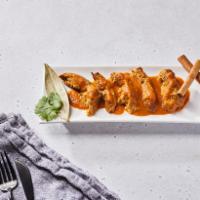 Chicken Tikka Masala by dosa by DOSA  · By dosa by DOSA. A world-famous curry loved for its richly spiced tomato flavor, steeped wit...