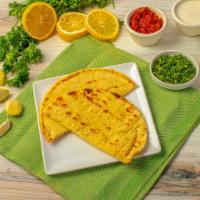 Pita · Classic Mediterranean bread, perfect for dipping. Vegetarian. Contains gluten. We cannot mak...