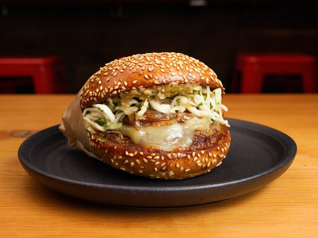 BBQ by Roam Artisan Burgers · By Roam Artisan Burgers. Aged White Cheddar, BBQ Sauce, Caramelized Onions, Jalapeño Relish, and Oil & Vinegar Slaw. 

(Contains dairy, soy, and eggs. We cannot make substitutions.)