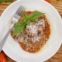 Meatballs · Four delicious meatballs with our pomodoro sauce topped with parmesan. Cuatro albondigas del...