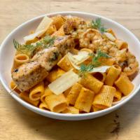 Seafood Rigatoni · Rigatoni pasta with salmon cubes, and shrimps cooked in seafood creamy sauce. Pasta rigatoni...