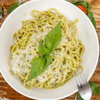 Simple Linguini Pesto · Linguini Pasta with our homemade pesto sauce, with an option to add cream, topped with parme...