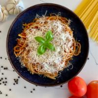 Simple Linguini Pomodoro · Linguini pasta with our special pomodoro sauce, topped with Parmesan.