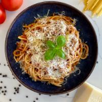 Simple Linguini Bolognese · Linguini pasta with our special bolognese sauce, with an option to add cream, topped with Pa...