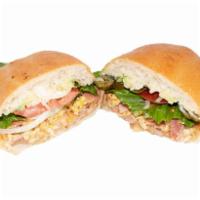 Torta de Jamon con Huevo · Ham with egg. Includes mayonnaise, cheese, lettuce, avocado, onion, tomato, beans, and jalap...