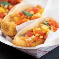 Crispy Fish Taco, two tacos · Corn tortilla, pacific cod, tempura batter, pickled slaw, pineapple relish, chipotle aioli &...