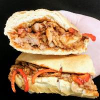 A Brother's Roasted Pork Hero · Slowly Roasted Pork, BBQ Sauce, Red Peppers, Red Onions & Provolone cheese on Toasted French.