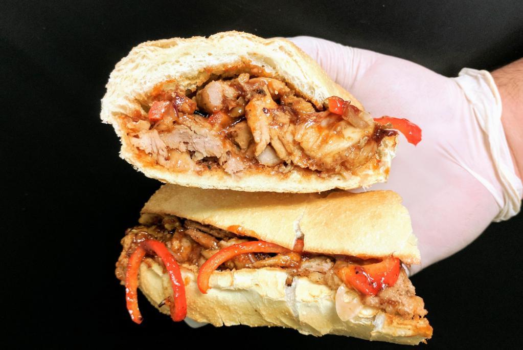 A Brother's Roasted Pork Hero · Slowly Roasted Pork, BBQ Sauce, Red Peppers, Red Onions & Provolone cheese on Toasted French.