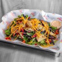 Full South West Chicken Salad · herb roasted chicken, cheddar cheese, fries tortilla strips, shredded ice berg lettuce, dice...