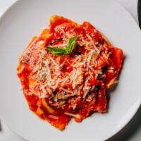 Ravioli Marinara (V) · Homemade ravioli filled with hand-dipped ricotta in a pomodoro sauce. Contains gluten, dairy...