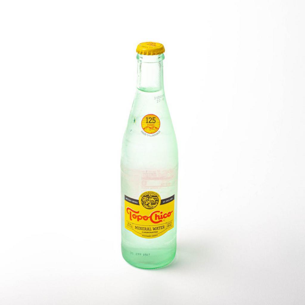 Topo Chico Mineral Water · 12 oz glass bottle of sparkling mineral water. Bottled at the source in Monterrey, Mexico since 1895 with a natural mineral composition perfect for quenching thirst!perfect for quenching thirst!