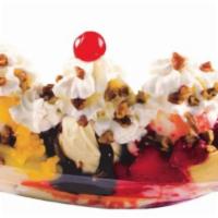 Banana Split Sundae · Chocolate syrup, strawberries, pineapple and toasted pecans. Add extra toppings for an addit...