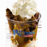 Peanut Butter Mountain Sundae · custard, peanut butter topping and Reese's cup.