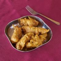 Chicken Pakoras · Chicken dipped in a garbanzo bean flour and deep fried. Gluten free.