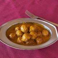 Lamb Meatballs · Lamb meatballs in a tomato based curry with fresh herbs.