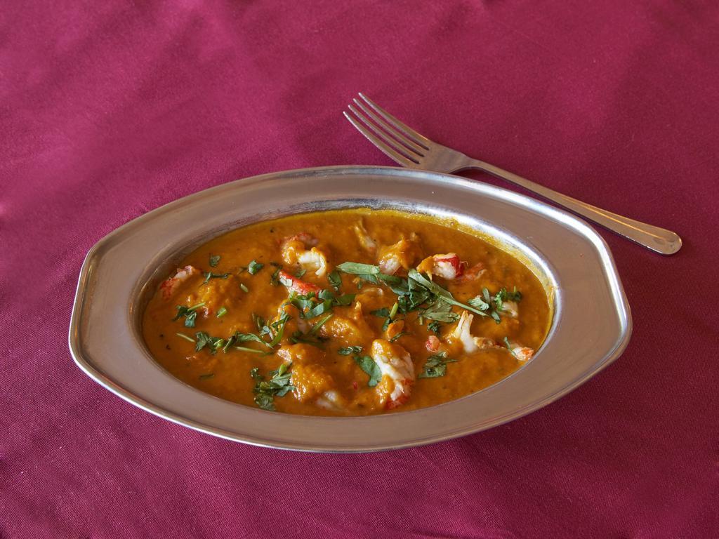 Crawfish Masala · Crawfish smothered in a tomato and coconut sauce.