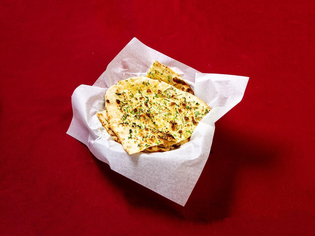 Lasuni Cheese Naan · Bread stuffed with fresh garlic and cheese.