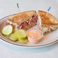Grilled Reuben Sandwich · Wigleys World Famous Corned beef, grilled sour kraut, and swiss cheese on grilled Rye bread....