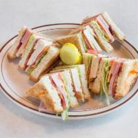 Clubhouse Sandwich · Triple Decker Sandwich with Fresh Turkey, ham, bacon, American Cheese, mayo, lettuce and tom...