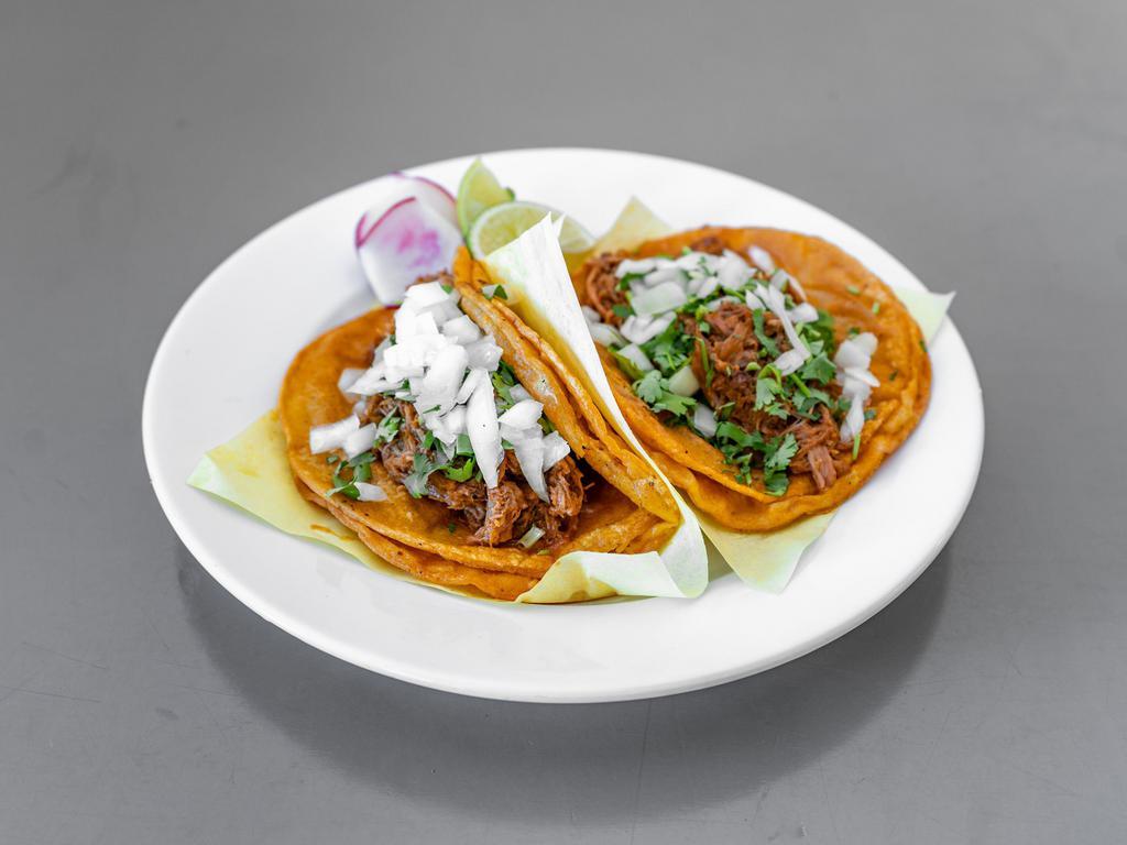 Taco de Maiz Birria · Deliciously Birria wrapped on a hot corn Tortilla 