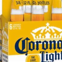 Corona · Must be 21 to purchase. 6 pack-12 oz. bottle beer (4.2% ABV).